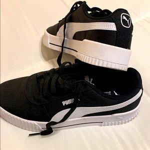 Women’s Black Pumas Size 8.5